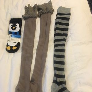 One pair of fuzzy socks and two pair of stockings.